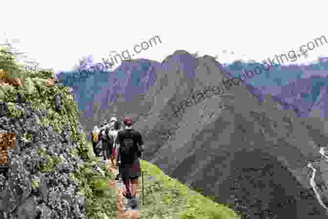 A Group Of Hikers Trekking Through The Andes Mountains In Peru, With Machu Picchu In The Background Peru Travel Guide 2024: Peru Hiking Lima Machu Picchu Colca Canyon Cusco Inca Trail
