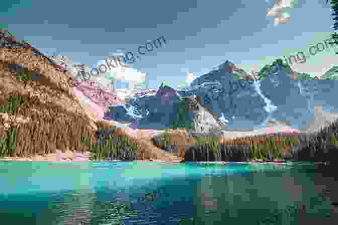 A View Of Banff National Park With Snow Capped Mountains, Turquoise Lakes, And Lush Forests Lonely Planet Banff Jasper And Glacier National Parks (Travel Guide)