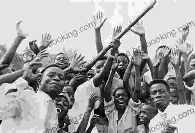 An Image Of People Celebrating Their Liberation From Colonial Rule Key Concepts In Postcolonial Literature (Key Concepts: Literature)