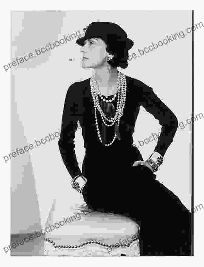Coco Chanel, Dressed In Black, With A White Flower In Her Hair, Looking Mysterious And Alluring. Sleeping With The Enemy: Coco Chanel S Secret War