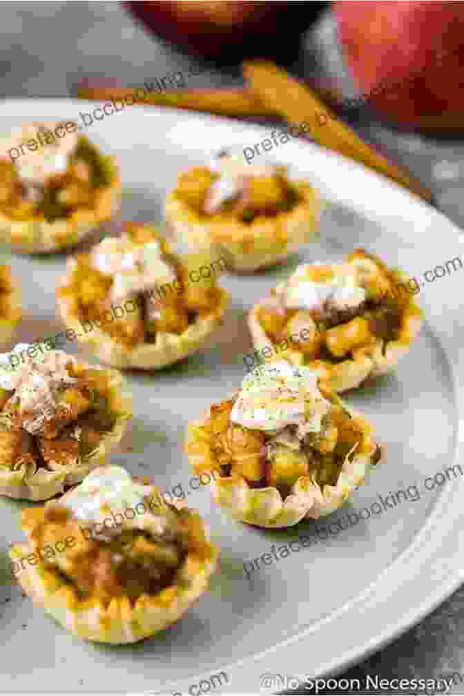 Golden Brown Apple Pie Bites Sitting On A Plate Air Fryer Baking: 25 Air Fryer Dessert Recipes For Family