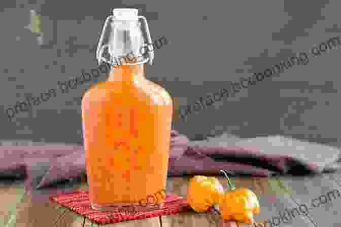 Photo Of A Bottle Of Sos Ti Malis, A Spicy Hot Pepper Sauce Most Popular Haitian Recipes Quick Easy: A Cookbook Of Essential Food Recipes Direct From Haiti